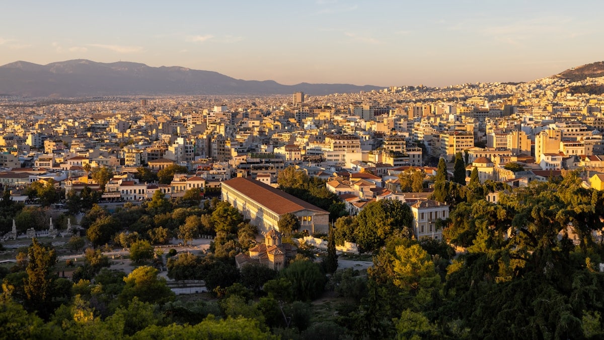 a city with many trees and buildings